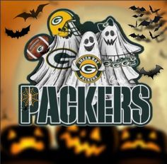 the green bay packers logo with bats and pumpkins in the background, on halloween night