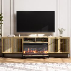 a living room with a fireplace and television on the wall in front of an entertainment center