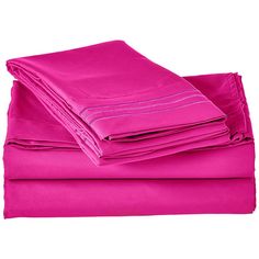 the pink sheets are folded on top of each other