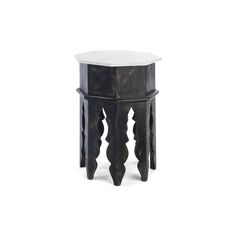 a small black and white table on a white background