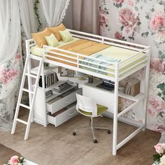 a white loft bed with a desk underneath it and flowers on the wall behind it