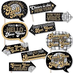 new years party photo booth props with gold and black text on them, including speech bubbles