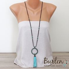 Long tassel pendant necklace with a ring with blue crystals in boho chic styles. The tassel is made of cotton threads in turquoise color. The size of the pendant is 5 / 15 cm (2 / 5.9 inches). The metal parts are made of brass. The velour cord is in dark brown color. The length of the velour cord is 95 cm (37.4 inches) with. The total length of the necklace is 110 cm (43.3 inches) + an extension 7 cm Your purchase comes gift wrapped International orders will take between 5-20 working days to arr Turquoise Bohemian Tassel Necklace, Bohemian Lariat Necklace With Tassels, Tassel Necklace Boho, Hippie Necklace, Dark Brown Color, Necklace Long, Brass Ring, Cluster Earrings, Turquoise Color