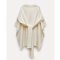 Nwt. Full Cut Sweater Made With Alpaca. Hooded Collar And Elbow-Length Sleeves. Multi-Positional Knotted Straps. Oversized Long Sleeve Chic Cape, Oversized Chic Long Sleeve Cape, Chic Oversized Long Sleeve Cape, Chic White Cape Outerwear, Oversized Beige Shawl Collar Outerwear, Chic Oversized Outerwear With Batwing Sleeve, Cozy Oversized Neutral Outerwear, Oversized Neutral Sweater Coat For Winter, White Oversized Cozy Outerwear