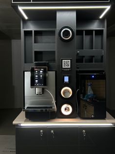 an entertainment center with speakers and lights on it