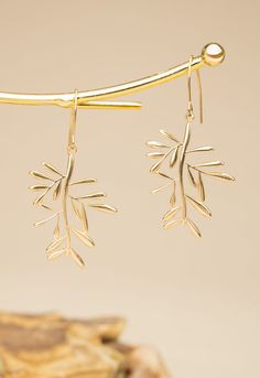 Support women building their paths to freedom with our Rooted & Rising Branch Earrings. These radiant 14k gold-plated earrings feature a stunning branch design, symbolizing the strength and resilience found in growth. With your purchase, you become part of a survivor's remarkable story. Thank you for supporting the women at Starfish Project to develop new skills and confidence, helping them take root and rise towards a brighter future. Wear and gift the Rooted & Rising Earrings with joy, a remin Future Wear, Starfish Project, Branch Earrings, Support Women, Branch Design, August Birthstone Jewelry, July Birthstone Jewelry, New Skills, Gifts For New Mums