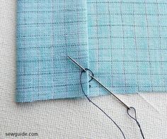 a piece of fabric with a needle on it