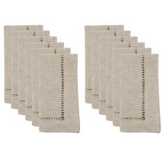 six linen placemats with stitching on them