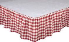 a red and white checkered bed skirt