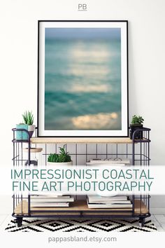 an art print with the words oversized & serene coastal art prints on it in front of a white wall