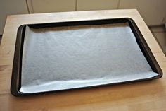 an empty baking tray on a wooden table