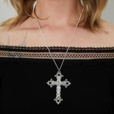 Embrace unique style with our Silver Gothic Cross Necklace. Elevate any outfit with this bold and elegant accessory. Stand out from the crowd with this one-of-a-kind piece that will add a touch of edgy sophistication to your wardrobe. Good to Know: Dainty chain that can be worn at a variety of lengths Our Charm Necklaces look incredible with our stunning Circle Earrings! Silver Plated  Charm Length 6mm x 4cm Diameter  Sizing Choker - 12-14" (Extendable), Short necklace - 16" Long necklace - 20" Edgy Metal Cross Jewelry, Edgy Cross-shaped Metal Jewelry, Silver Cross Pendant Jewelry For Party, Silver Cross Pendant Necklace For Party, Gothic Cross Pendant Jewelry For Party, Silver Cross Jewelry For Party, Silver Cross Necklace For Party, Trendy Cross Jewelry For Party, Bohemian Cross Jewelry For Party