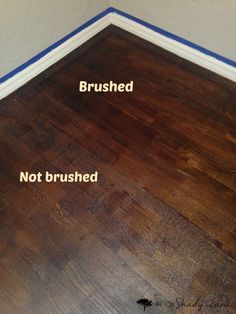 two different types of wood flooring that are not brushed and not stained with blue tape