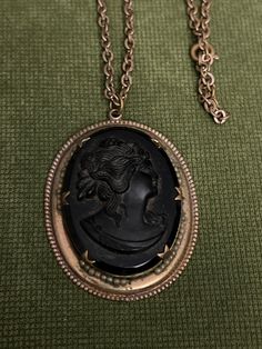 Two inch Pendsnt Black Jet carved cameo  Long 32 inch brass chain Vintage Cameo Metal Jewelry, Vintage Metal Cameo Jewelry, Antique Cameo Metal Jewelry, Antique Metal Cameo Jewelry, Black Jet, Brass Chain, Pendant Necklaces, Jewelry Necklace Pendant, Etsy Accessories