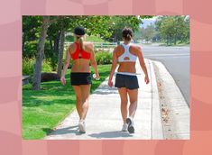 two women are walking down the sidewalk with tennis rackets in their hands and one is wearing a red sports bra