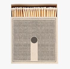 matches in a cardboard box on a white background