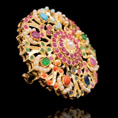 Adorn in the colors of nauratan accessories and beautify your hands with our Visha Ring! Paint a splash of colors in your festive attire with beautiful ring embellished with majestic stones. This ring can be paired with any of the ornaments from our Nauratan Essentials. Gold-plated on high-quality brass as base metal. Made by order. Kindly allow 5-7 weeks for the delivery of this item. For custom or urgent requests, please contact support@alacouture.com. *Please Note: We use faux stones and bead Festive Attire, Unique Gift Cards, Create Words, Faux Stone, Beautiful Ring, Base Metal, Free Giveaway, Beautiful Rings, Color Splash