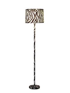 a zebra print floor lamp on a white background