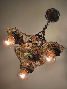 an ornate chandelier hanging from the ceiling