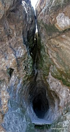 an aerial view of a tunnel in the side of a mountain