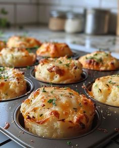 freshly baked muffins are sitting in the pan