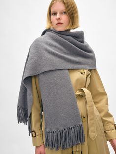 Our newest scarf is the perfect addition to your cold-weather wardrobe. Crafted from a cozy merino wool-cashmere blend, it boasts hand-twisted tassels at each end. The generous width allows you to wrap, knot and layer the accessory with ease. Details "70 1/2 X 27". 70% Wool, 30% Cashmere. Dry clean only. Style #21050 Twisted Scarf, Travel Wrap, Tassel Scarf, Triangle Scarf, White Shop, Scarf Shawl, Womens Scarves, Scarf Wrap, Cold Weather