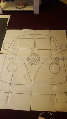 the paper is cut out to look like a vw bug