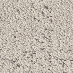 the texture of carpet is white and gray