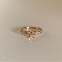 Brand New. Dainty Gold Bow Ring. Faux Diamonds In Setting. Comes In Velvet Dust Pouch. Ring Size 7.5 Xoxo Jewelry, Cute Promise Rings, Pretty Jewelry Necklaces, Bow Ring, Jewelry Accessories Ideas, Expensive Jewelry, Jewelry Essentials, Jewelry Lookbook, Ring Color