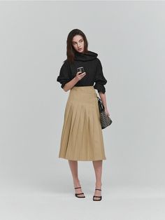 This is L’H.A.S’s clean-looking midi pleated wrap skirt. It features sturdy press pleats, creating a structured pleated skirt. The inner button allows for size adjustment, while the waist provides support and flows slightly outward into an A-line silhouette, giving a slim appearance. With side bias details and an asymmetrical hemline, it can be worn both alone and paired with various inner pieces to create a stylish focal point. It pairs well with slim-fit jackets for a sophisticated look.- Perfect for daily wear- Can be paired with different styles of tops to create various looks- A basic item that can be styled well with any look Pleats Skirt, Wrap Midi Skirt, Slim Fit Jackets, Wrap Skirt, Pleated Skirt, Different Styles, Focal Point, Daily Wear, Midi Skirt