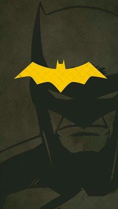 the batman movie poster is shown with yellow and black colors on it's face