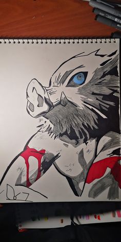 a drawing of an eagle with blue eyes