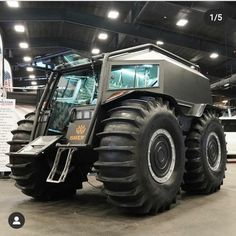 an enormous vehicle is on display in a building