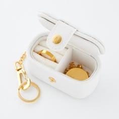 The travel case you've been waiting for. Our all new miniature jewelry box is the perfect gift to a loved one or to yourself. With ring inserts and a section for your favorite chains, this small jewelry box is meant for all your on-the-go days. With an 18 karat gold plated keychain attachment and gold plated button clasp, this box is meant for the daily essentials. Forever. Consisting of two side-by-side sections where you can place your smaller items such as rings, earrings, and nose rings, thi Miniature Jewelry, Doll Closet, Princess Jewelry, Shiny Objects, Travel Jewelry Box, Jewelry Accessories Ideas, Girly Accessories, Small Jewelry Box, Travel Jewelry Case