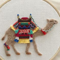 the camel is made out of felt and thread