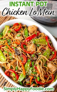 instant pot chicken lo mein in a white bowl with chopsticks on the side