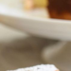 a piece of cake sitting on top of a white plate