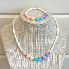 "This is a set of 2! You get a matching bracelet and heart necklace.  This cute pastel, HEART necklace and bracelet set makes a great present for birthdays!  This 15\" stretchy necklace fits right over your head so it's easy to put on- no clasps needed.  🤍 Please check all selections prior to check out. Our custom jewelry is made to order so all sales are final.  🤍 This set is beautifully packaged and ready to gift. Receipts are never included. If you want to include a special note, please let Beaded Jewelry Kids, Playful Pink Beaded Necklaces For Birthdays, Cute Pink Heart Beads Necklace, Valentine Necklaces For Kids, Diy Necklace Kids, Kids Beaded Necklace, Handmade Bracelets Tutorial, Necklace For Kids, Pastel Heart