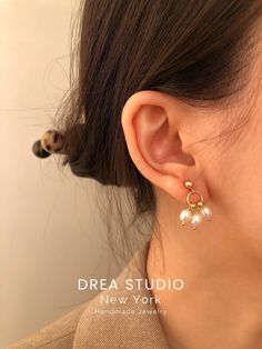 "This 14K Gold pearl earring is delicate and simple. Tiny in size, but not impact. It will also be a unique handmade gift for your loved ones.  ✿ Material: High-Quality Natural Freshwater Pearl        ✿ Featuring 14K US Gold Filled Wire Wrapped with Freshwater Pearl.     ✿ Size: Approx. 7/8 inch in full length     ✿ Sold as a pair     ✿ P L E A S E   N O T E:     All of our freshwater pearls are all-natural and unique, therefore each piece might have a slight blemish on it and won't exactly like Ball Drop Earrings, Freshwater Pearl Earrings, Ball Drop, Gold Pearl Earrings, Freshwater Pearls Earrings, Pearl Earring, Handmade Jewelry Designs, Trendy Necklaces, Pearl Earrings Dangle