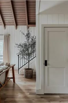 a white door with the words contrast trim on it in front of a wooden floor