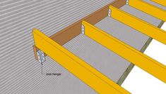 the bottom half of a deck with yellow slats on it and an electrical outlet