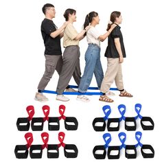 several people are walking on a rope with blue and red clips in front of them