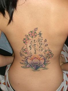 a woman with a tattoo on her back