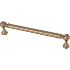 an antique brass pull handle on a white background