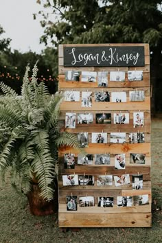 a wooden sign that has photos on it