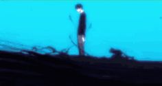 a blurry image of a person standing in the dark