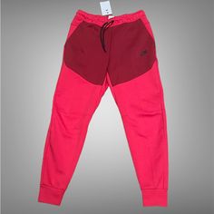 Nike Tech Fleece Joggers Pants Red Berry Pomegranate Cu4495-643 Men's Medium Nwt New With Tags Red Winter Athleisure Pants, Winter Sportswear Red Bottoms, Red Winter Sports Pants, Red Winter Joggers, Red Sports Pants For Winter, Red Winter Sports Joggers, Sporty Red Sweatpants For Winter, Red Cotton Winter Joggers, Winter Casual Red Joggers