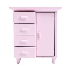 a small pink cabinet with three drawers