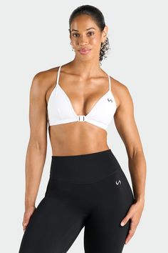 Model Specs: Savannah Is 5'9”, 140lbs Bust: 32A And Wearing A Small (Tempo Front Clasp Sports Bra) Front Clasp Closure To Easily Put On And Take Off Luxe DNA™ Fabric: Virtually Weightless + Buttery Soft + Breathable + Sweat-Wicking Infi-Soft DNA™, Infi-Stretch DNA™ Technologies Sweat-Wicking DNA™ Technology Provides Breathable Moisture-Wicking Properties Helping To Keep You Cool And Dry Multi-Back Strap Bra Design Provides Low to Medium Support and Versatility with Adjustable Straps for a Straight, Halter Top, Or Criss Cross Styling 100% Support And Optimal Training Mobility. 0% Restriction Designed For: Light to Moderate Impact (Workouts, Light Cardio, All-Day Wear) Fit: Fitted Lining: 75% Polyamide / 25% Elastane, Shell: 75% Polyamide / 25% Elastane Fabric: Luxe DNA™ (75% Polyamide / 25% Light Cardio, Sweaty Workout, Tlf Apparel, Bra Design, Sweaty Workouts, White Sports Bra, Workout Session, Bra Straps, Athletic Fits