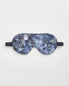 Add a touch of luxury to your nightly repose with our Nocturnal Garden Sleep Mask in Midnight Blue. Printed with a classic tale of nature that sets the scene for a fairytale slumber. The print features on both sides offering versatility to wear how you wish. Carefully crafted from Lyocell, a sustainable fabric made from wood pulp that is kind to sensitive skin, allowing you to drift away in serenity and awaken refreshed and ready to embrace the day.
  Key features:
  One Size
 Ultra soft and bre Fable England, Swan Jewelry, Cottage Quilt, Sustainable Fabric, Storage Pouch, Sleep Mask, Sustainable Fabrics, The Scene, Midnight Blue